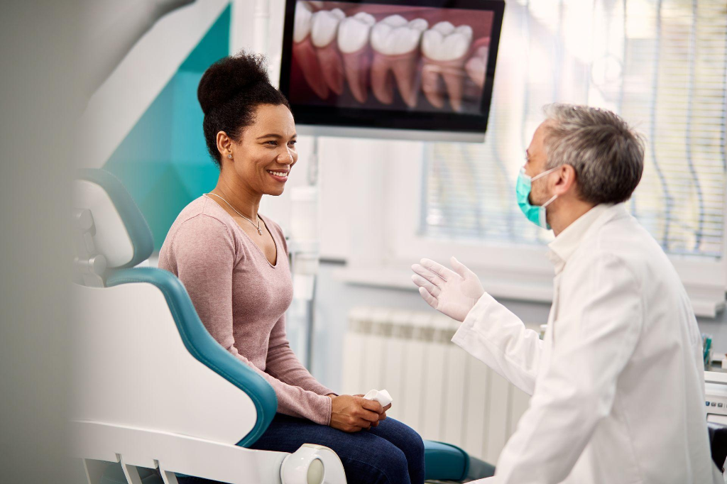 Dentist discussing treatment options with patient at Bantry Dental